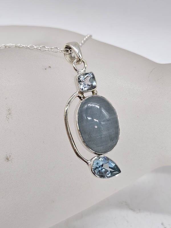 Sterling Silver Aquamarine and Topaz Twist Pendant on Silver Chain