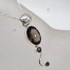 Sterling Silver Smokey Quartz Oval and Round on Curved Twist Pendant on Silver Chain