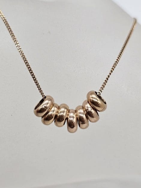 9ct Yellow Gold Seven Lucky Rings Pendant on Gold Chain